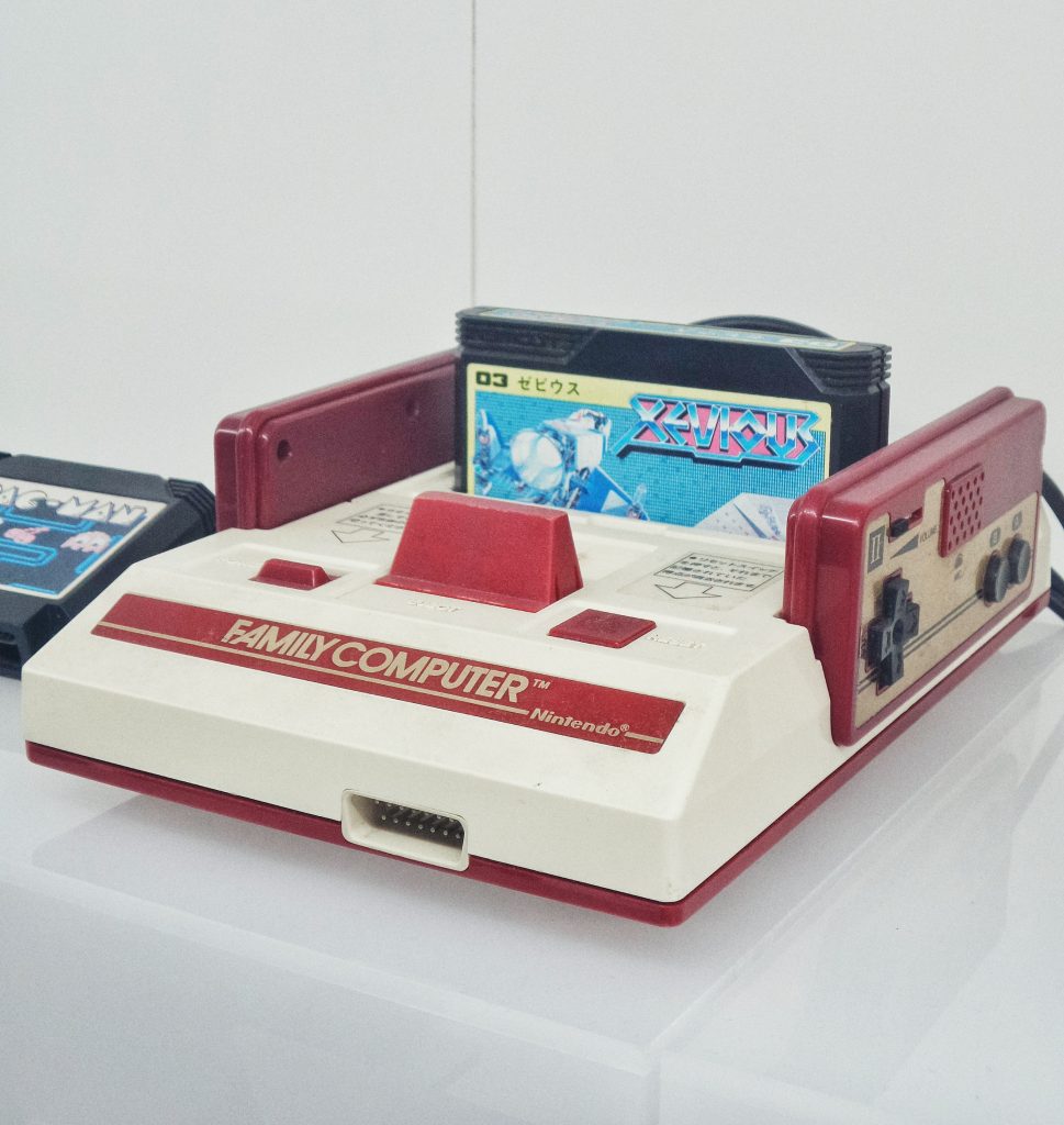 A nintendo entertainment system with a copy of Xeviour. 