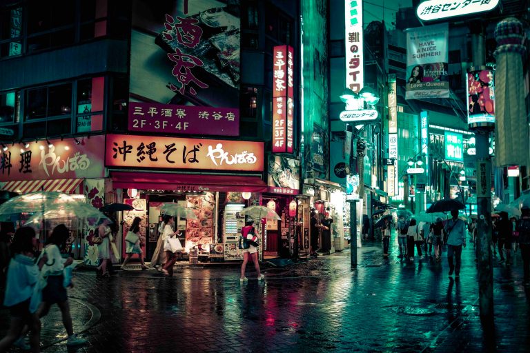 Rain in Tokyo people walking with their umbrellas