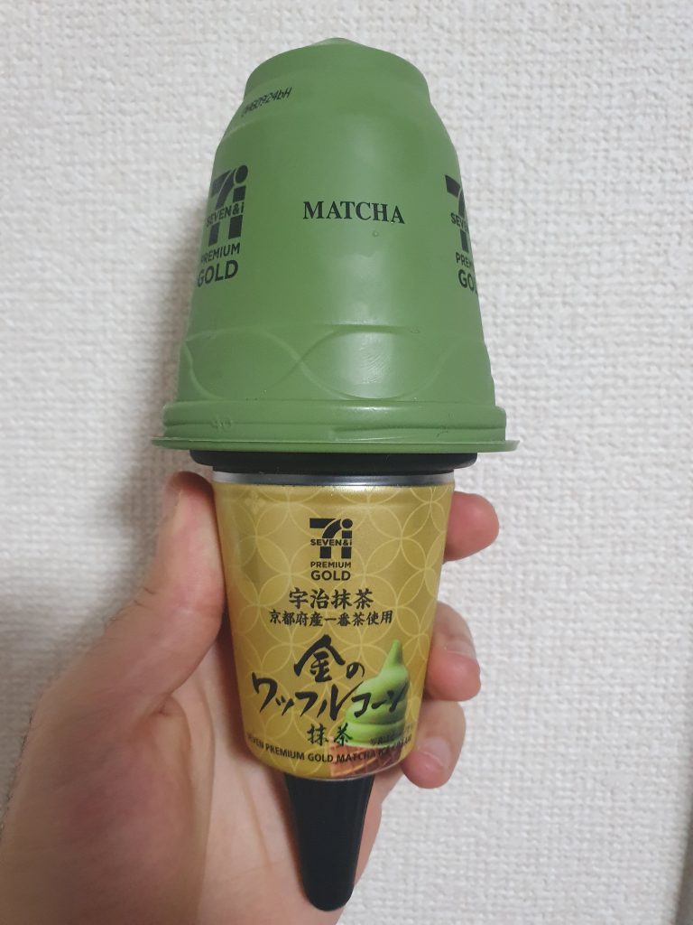 Holding a Matcha ice cream from 7/11 one of the unique Japanese ice creams