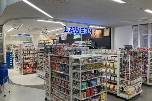 Inside a Japanese convenience store with snacks and drinks
